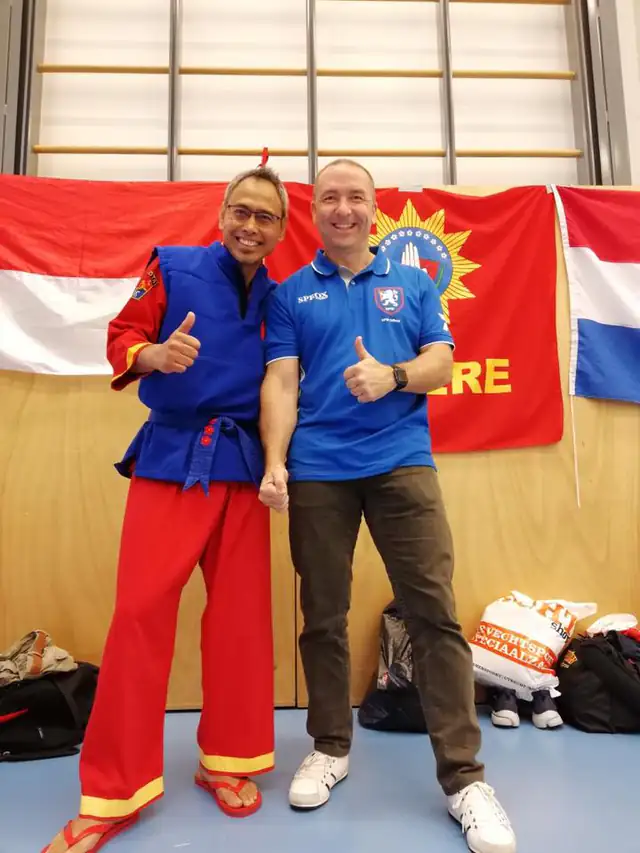 Andi Syams met voorzitter van de NPSF Olivier Blancquaert